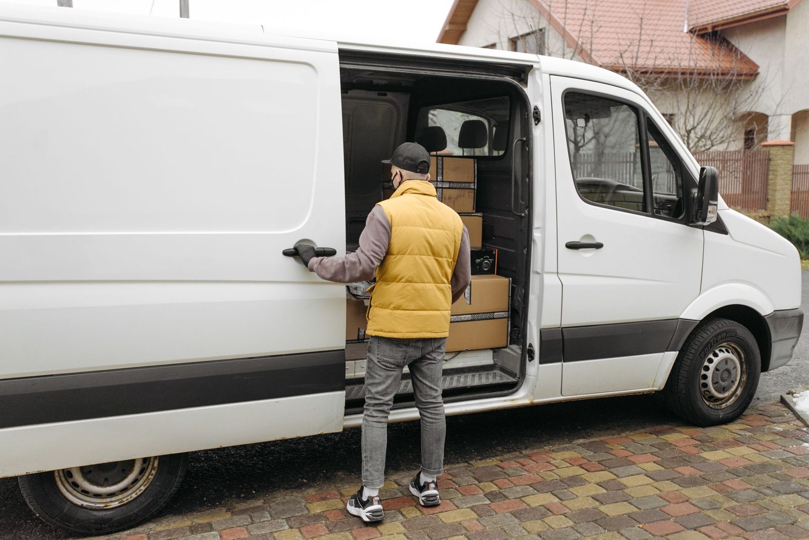 Man loading items into a van
